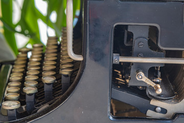 Detail of a historic dusty mechanical typewriter made in Germany during the twenties of the 20th...