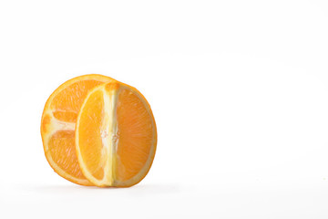 Half and vertical quarter of fresh juicy orange on a neutral white background