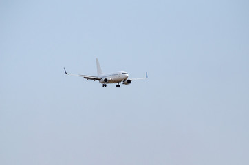 Fototapeta na wymiar Passeger Airplane landing position 