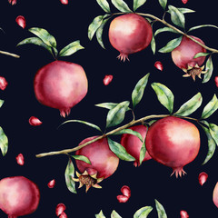 Watercolor pomegranate and berries seamless pattern. Hand painted garnet fruit, branch, leaves isolated on dark blue background. Floral elegant illustration for design, print, fabric or background.