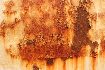 Old worn metal surface with paint. Rusty metal texture. Metal sheet with rust and worn paint, metal...