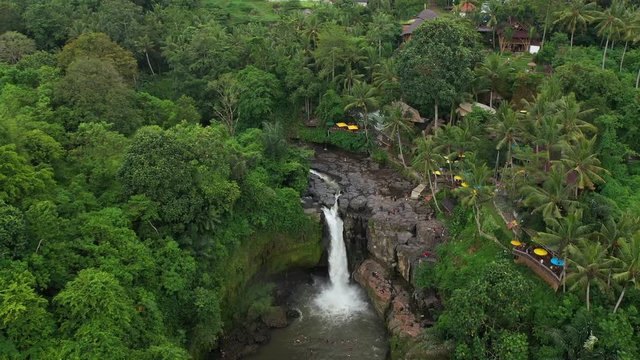 Tegenungan Waterfall in a rainforest near Ubud, Bali. Aerial 4k footage.