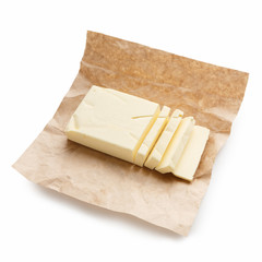 Piece of butter on white background