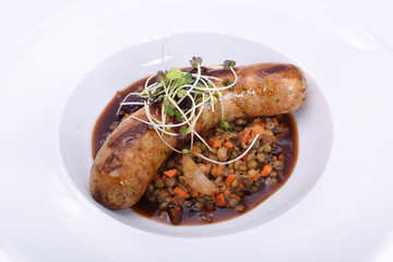Homemade sausage with lentils and vegetables