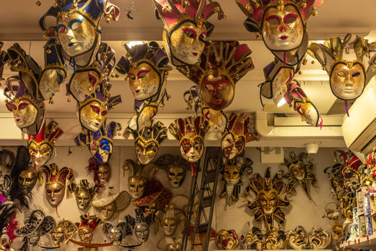 Italy, Venice, carnival 2019, typical Venetian masks and costumes in shop windows and in the street.