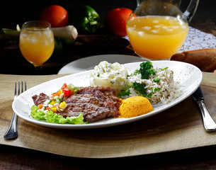 Grilled meat with trimmings