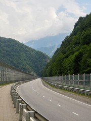 Modern road among the green mountains