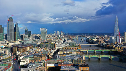 Aerial drone bird's eye view of iconic skyline in City of London, United Kingdom