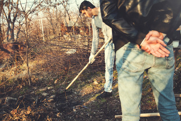 boss with worker in garden