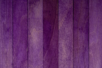 Beautiful texture of natural wood slats purple. Vertical direction