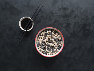 Chinese Black and White stewed beans on a black.