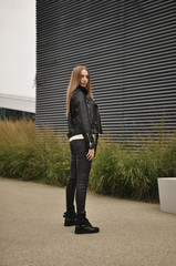 beautiful girl walking in stylish clothes