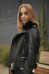 beautiful girl walking in stylish clothes