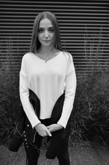 beautiful girl walking in stylish clothes