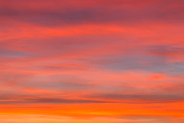 burning sky at sunset. Red sky abstract background. pink cloudy sky. Colorful sunset background 
