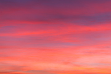 burning sky at sunset. Red sky abstract background. pink cloudy sky. Colorful sunset background 
