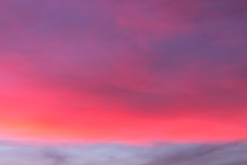 burning sky at sunset. Red sky abstract background. pink cloudy sky. Colorful sunset background 