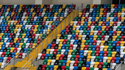Empty stadium with seats of different colors