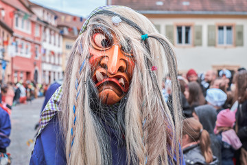 Witch with funny hairstyle. Street Carnival in Southern Germany - Black Forest.