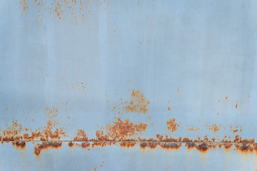 Fototapeta premium Old iron wall covered with white paint. Abstract background.
