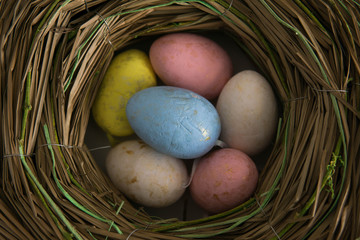 Colorful easter eggs in nest