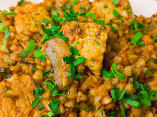 Buckwheat porridge with meat, mushrooms and herbs
