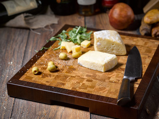 Beautiful cutting board with cheese