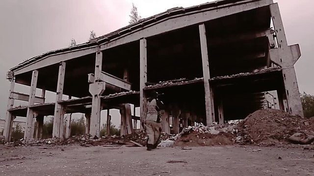 Stalker survivalist with a crossbow and found things sneaks through the ruins looking around. eg presleduet someone. He's careful. Post-apocalyptic landscape