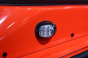 Left navigation light on Board orange motor boat