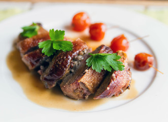 Duck roll in demi-glace sauce