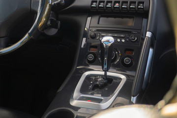 Naklejka premium automatic gear parked inside modern vehicle car automobile