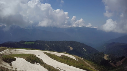 Panorama of beautiful mountain valley from the top of roza khutor mountains © iaginzburg