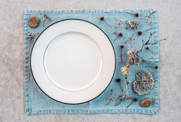 Table setting decorated with Scandinavian wild plants