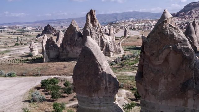 Aerial photography from drone, flight between the mountains of Cappadocia, Goreme. Landscape Panaroma. Aerial view. Turkey 4k