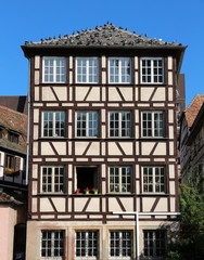 Fototapeta premium Strasbourg - France- traditional half-timbering building