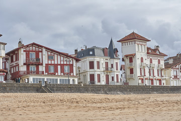 A view of the French coast of San Juan de Luz with typical colored houses.