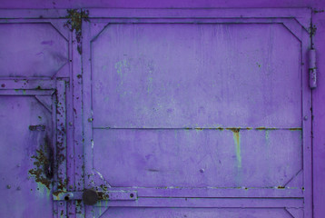 purple metal grunge closed door with round lock