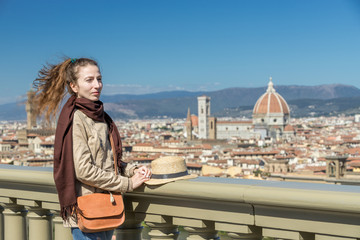 girl looking at the city of Florence from the viewpoint