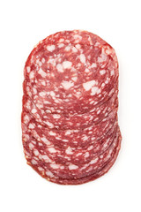 Sliced Smoked sausage or salami, close-up, isolated on white background. Top view