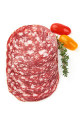 Sliced Smoked sausage or salami, close-up, isolated on white background. Top view