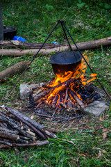 cauldron on campfire