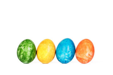 Easter eggs in a row isolated on white background