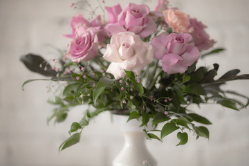 Bouquet of lilac roses and other flowers