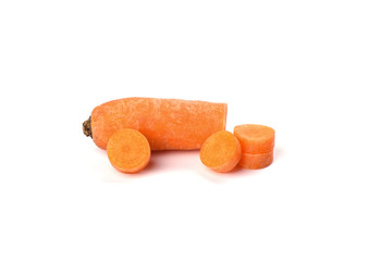 Carrot sliced into round slices isolated on white background.