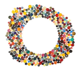 background with round frame - multicolored buttons on a white surface