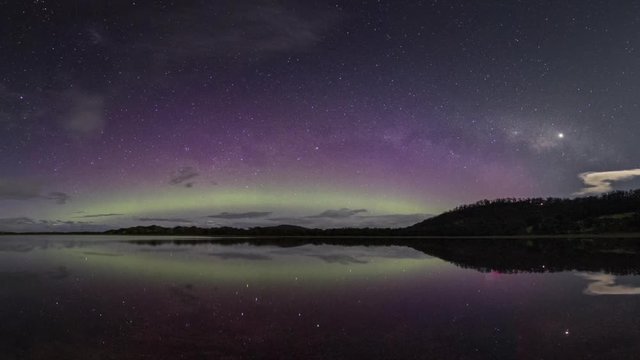 Aurora Australis or Southern Lights display, spectacularly bright and vivid colours, beams reaching high into the sky