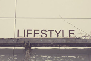 A standard or common lifestyle sign on a wooden structure