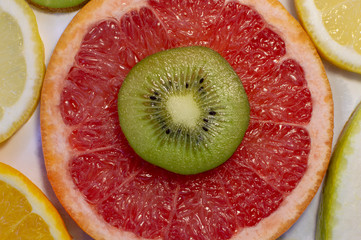 Citrus fruit slices on table