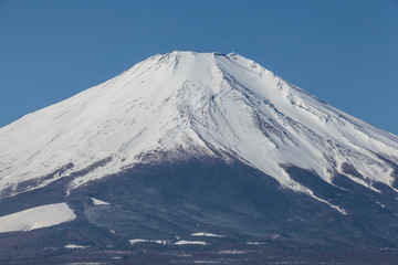 Fototapeta na wymiar Top of Mt.fuji that is covered with snow in winter