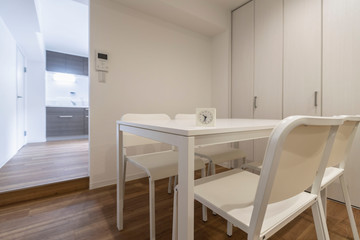 White dining table in the dining room